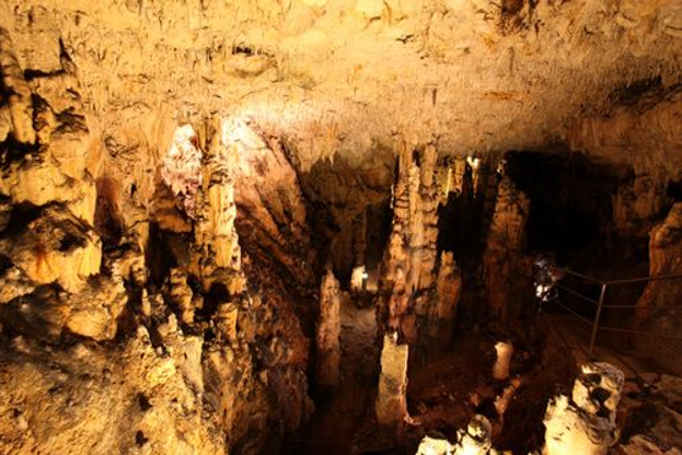 The interior of the Biserujka Cave with stalactites, stalagmites and calcite sigs formations.